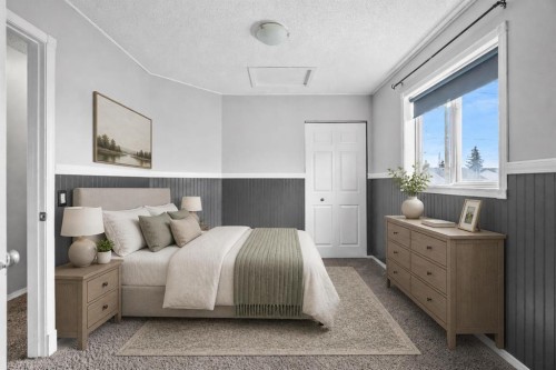 14700 Mt Mckenzie Drive Se, Calgary, AB - Indoor Photo Showing Bedroom