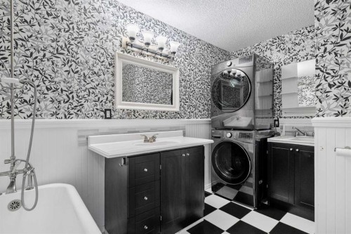 14700 Mt Mckenzie Drive Se, Calgary, AB - Indoor Photo Showing Laundry Room