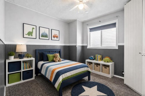 14700 Mt Mckenzie Drive Se, Calgary, AB - Indoor Photo Showing Bedroom