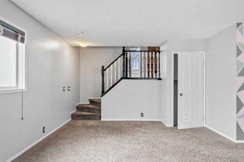 14700 Mt Mckenzie Drive Se, Calgary, AB - Indoor Photo Showing Other Room