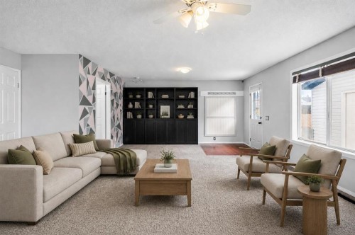 14700 Mt Mckenzie Drive Se, Calgary, AB - Indoor Photo Showing Living Room