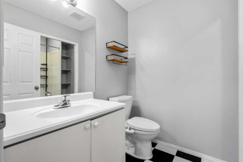14700 Mt Mckenzie Drive Se, Calgary, AB - Indoor Photo Showing Bathroom