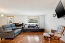 95 Mchugh Road Ne, Calgary, AB  - Indoor Photo Showing Living Room 