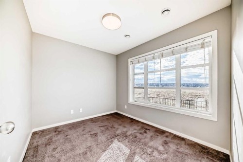 911 Evansridge Park Nw, Calgary, AB - Indoor Photo Showing Other Room