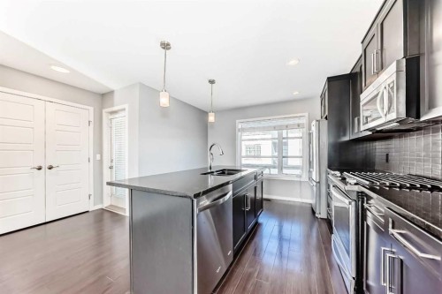 911 Evansridge Park Nw, Calgary, AB - Indoor Photo Showing Kitchen With Stainless Steel Kitchen With Upgraded Kitchen