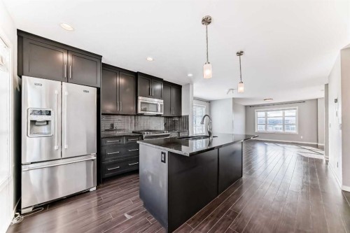 911 Evansridge Park Nw, Calgary, AB - Indoor Photo Showing Kitchen With Stainless Steel Kitchen With Upgraded Kitchen