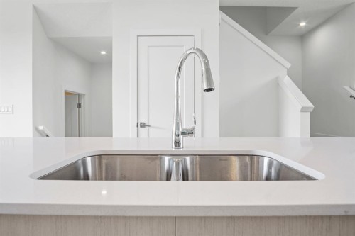 277 Dawson Way, Chestermere, AB - Indoor Photo Showing Kitchen With Double Sink