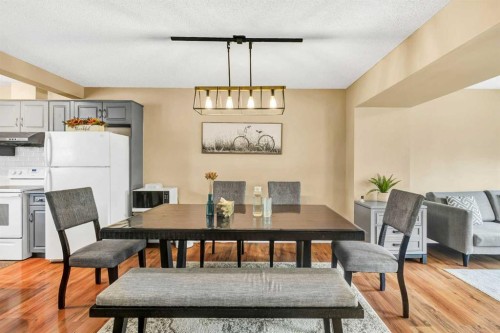 3-200 Hidden Hills Terrace Nw, Calgary, AB - Indoor Photo Showing Dining Room
