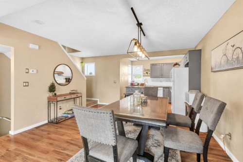 3-200 Hidden Hills Terrace Nw, Calgary, AB - Indoor Photo Showing Dining Room
