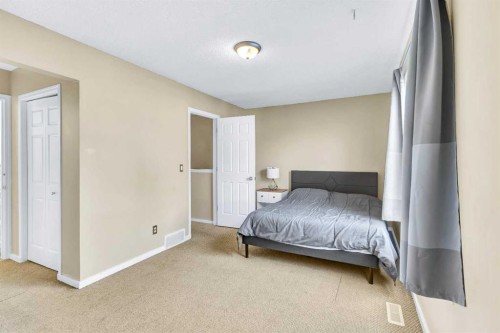 3-200 Hidden Hills Terrace Nw, Calgary, AB - Indoor Photo Showing Bedroom