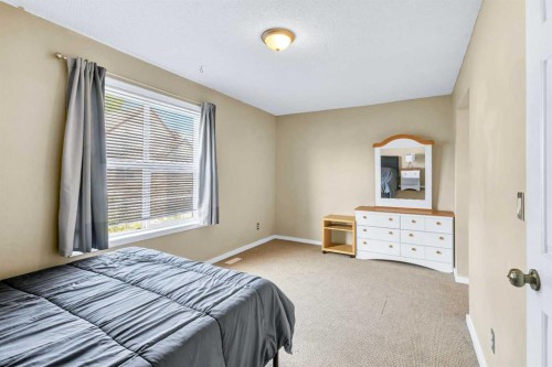 3-200 Hidden Hills Terrace Nw, Calgary, AB - Indoor Photo Showing Bedroom
