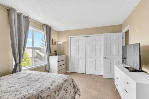 3-200 Hidden Hills Terrace Nw, Calgary, AB - Indoor Photo Showing Bedroom