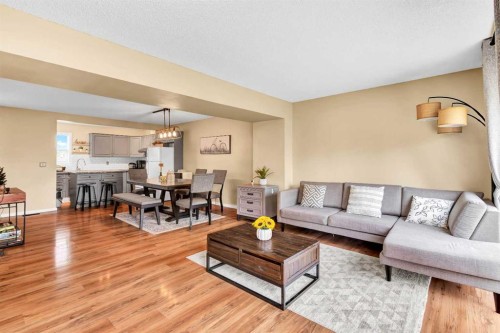 3-200 Hidden Hills Terrace Nw, Calgary, AB - Indoor Photo Showing Living Room