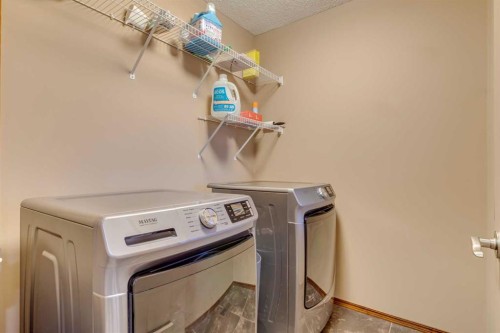 676 Auburn Bay Boulevard Se, Calgary, AB - Indoor Photo Showing Laundry Room