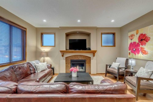 676 Auburn Bay Boulevard Se, Calgary, AB - Indoor Photo Showing Living Room With Fireplace
