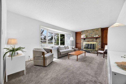 1232 40 Avenue Nw, Calgary, AB - Indoor Photo Showing Living Room With Fireplace