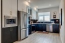 317-8235 8 Avenue Sw, Calgary, AB  - Indoor Photo Showing Kitchen With Upgraded Kitchen 