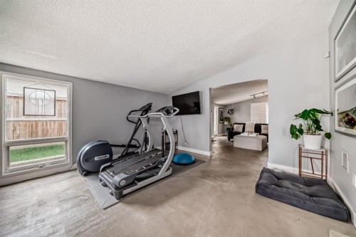 5519 Buckthorn Road Nw, Calgary, AB - Indoor Photo Showing Gym Room