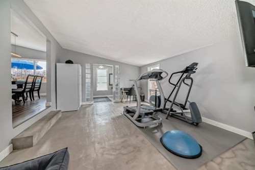 5519 Buckthorn Road Nw, Calgary, AB - Indoor Photo Showing Gym Room