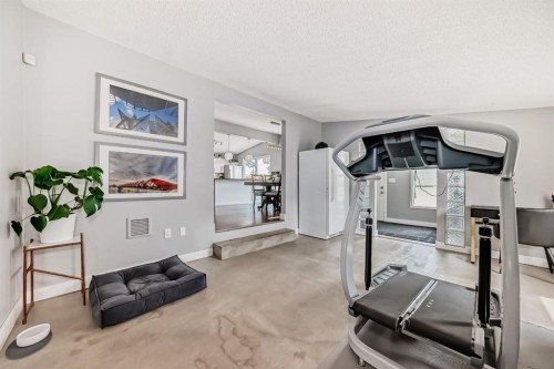 5519 Buckthorn Road Nw, Calgary, AB - Indoor Photo Showing Gym Room