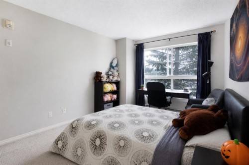216-5115 Richard Road Sw, Calgary, AB - Indoor Photo Showing Bedroom