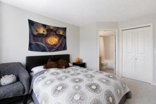 216-5115 Richard Road Sw, Calgary, AB - Indoor Photo Showing Bedroom