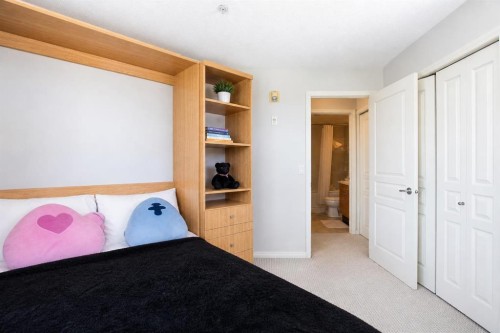 216-5115 Richard Road Sw, Calgary, AB - Indoor Photo Showing Bedroom