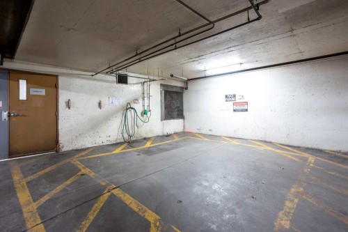 216-5115 Richard Road Sw, Calgary, AB - Indoor Photo Showing Garage