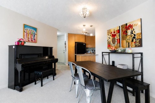 216-5115 Richard Road Sw, Calgary, AB - Indoor Photo Showing Dining Room