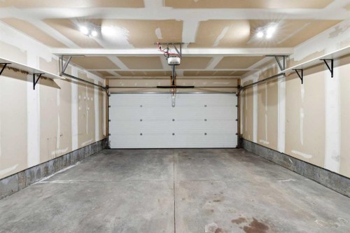 420 Mckenzie Towne Square Se, Calgary, AB - Indoor Photo Showing Garage
