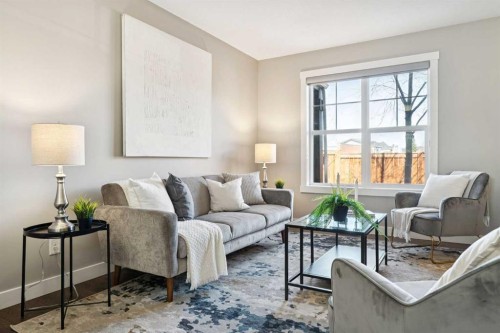 420 Mckenzie Towne Square Se, Calgary, AB - Indoor Photo Showing Living Room