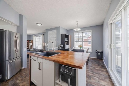 322 Mckenzie Towne Link Se, Calgary, AB - Indoor Photo Showing Kitchen With Upgraded Kitchen