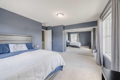 322 Mckenzie Towne Link Se, Calgary, AB - Indoor Photo Showing Bedroom