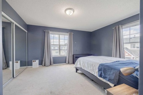 322 Mckenzie Towne Link Se, Calgary, AB - Indoor Photo Showing Bedroom