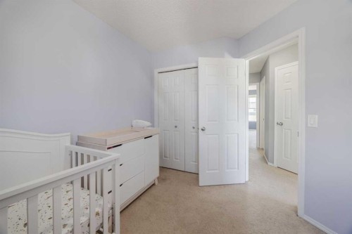 322 Mckenzie Towne Link Se, Calgary, AB - Indoor Photo Showing Bedroom
