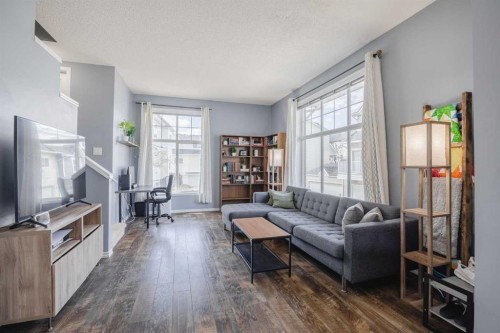 322 Mckenzie Towne Link Se, Calgary, AB - Indoor Photo Showing Living Room