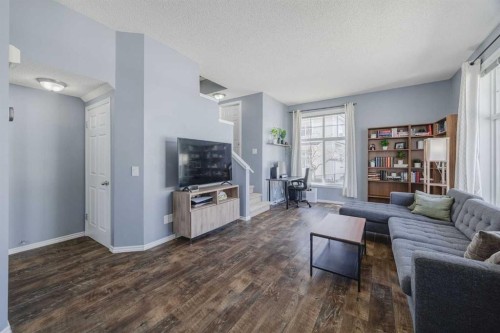 322 Mckenzie Towne Link Se, Calgary, AB - Indoor Photo Showing Living Room