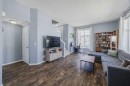 322 Mckenzie Towne Link Se, Calgary, AB  - Indoor Photo Showing Living Room 
