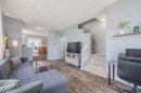 322 Mckenzie Towne Link Se, Calgary, AB  - Indoor Photo Showing Living Room 
