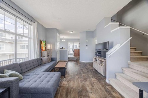 322 Mckenzie Towne Link Se, Calgary, AB - Indoor Photo Showing Living Room
