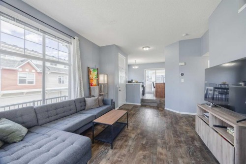 322 Mckenzie Towne Link Se, Calgary, AB - Indoor Photo Showing Living Room