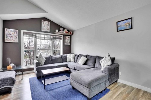 4 Martin Crossing Bay Ne, Calgary, AB - Indoor Photo Showing Living Room