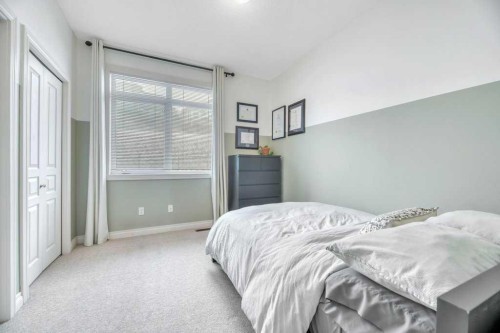 13-148 Rockyledge View Nw, Calgary, AB - Indoor Photo Showing Bedroom