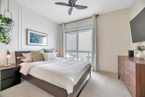 13-148 Rockyledge View Nw, Calgary, AB - Indoor Photo Showing Bedroom