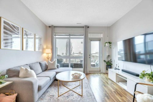13-148 Rockyledge View Nw, Calgary, AB - Indoor Photo Showing Living Room