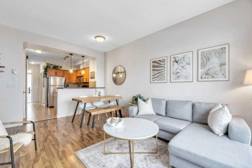 13-148 Rockyledge View Nw, Calgary, AB - Indoor Photo Showing Living Room