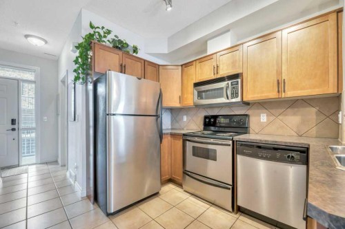 13-148 Rockyledge View Nw, Calgary, AB - Indoor Photo Showing Kitchen With Stainless Steel Kitchen