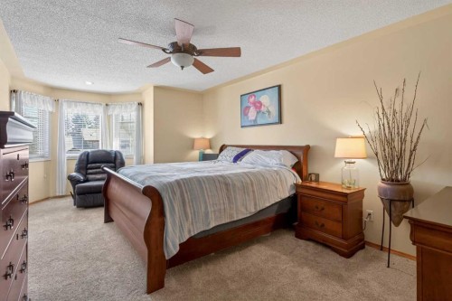 1486 Sunwood Road Se, Calgary, AB - Indoor Photo Showing Bedroom