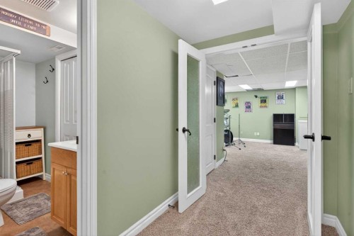 1486 Sunwood Road Se, Calgary, AB - Indoor Photo Showing Other Room