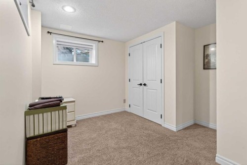 1486 Sunwood Road Se, Calgary, AB - Indoor Photo Showing Other Room